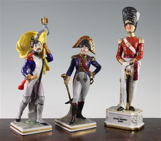 Two German porcelain models of Napoleonic soldiers and another of officer of the Grenadier Guards, 24cm - 31.5cm